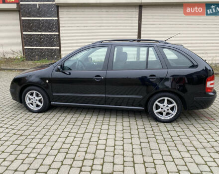Черный Шкода Фабия, объемом двигателя 1.4 л и пробегом 171 тыс. км за 5350 $, фото 14 на Automoto.ua