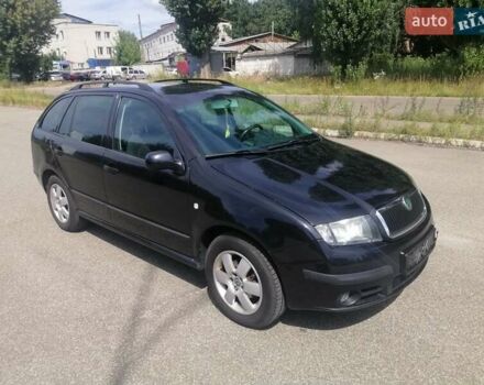 Черный Шкода Фабия, объемом двигателя 1.4 л и пробегом 235 тыс. км за 4700 $, фото 2 на Automoto.ua