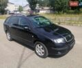Черный Шкода Фабия, объемом двигателя 1.4 л и пробегом 235 тыс. км за 4700 $, фото 2 на Automoto.ua