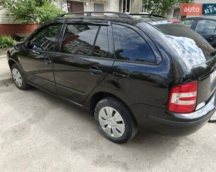 Черный Шкода Фабия, объемом двигателя 1.39 л и пробегом 304 тыс. км за 4100 $, фото 4 на Automoto.ua