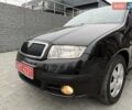 Черный Шкода Фабия, объемом двигателя 1.39 л и пробегом 249 тыс. км за 4550 $, фото 26 на Automoto.ua