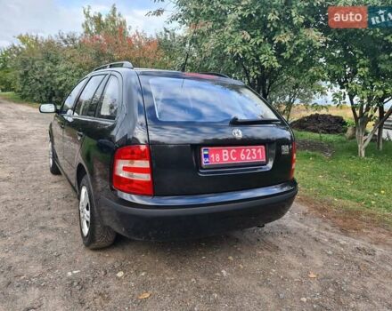 Черный Шкода Фабия, объемом двигателя 1.4 л и пробегом 196 тыс. км за 4699 $, фото 4 на Automoto.ua