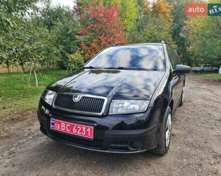 Черный Шкода Фабия, объемом двигателя 1.4 л и пробегом 196 тыс. км за 4699 $, фото 1 на Automoto.ua