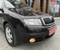 Черный Шкода Фабия, объемом двигателя 1.39 л и пробегом 249 тыс. км за 4550 $, фото 22 на Automoto.ua