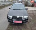 Черный Шкода Фабия, объемом двигателя 1.39 л и пробегом 151 тыс. км за 4500 $, фото 1 на Automoto.ua