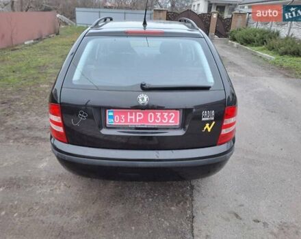 Черный Шкода Фабия, объемом двигателя 1.39 л и пробегом 151 тыс. км за 4500 $, фото 3 на Automoto.ua