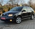 Чорний Шкода Фабія, об'ємом двигуна 1.4 л та пробігом 206 тис. км за 4399 $, фото 1 на Automoto.ua