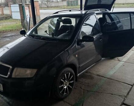 Черный Шкода Фабия, объемом двигателя 1.39 л и пробегом 250 тыс. км за 6000 $, фото 2 на Automoto.ua