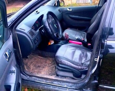 Черный Шкода Фабия, объемом двигателя 1.4 л и пробегом 220 тыс. км за 4444 $, фото 1 на Automoto.ua