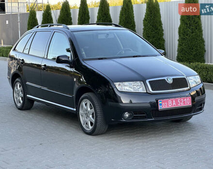 Черный Шкода Фабия, объемом двигателя 1.4 л и пробегом 230 тыс. км за 5200 $, фото 1 на Automoto.ua