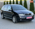Черный Шкода Фабия, объемом двигателя 1.4 л и пробегом 230 тыс. км за 5200 $, фото 1 на Automoto.ua