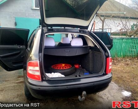 Черный Шкода Фабия, объемом двигателя 1.4 л и пробегом 250 тыс. км за 4350 $, фото 3 на Automoto.ua