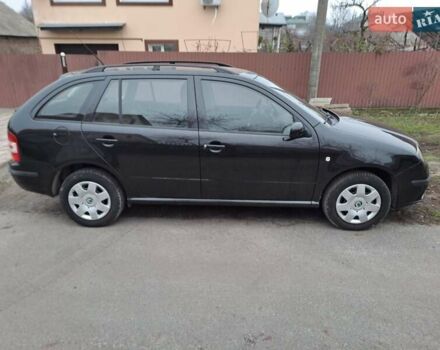 Черный Шкода Фабия, объемом двигателя 1.39 л и пробегом 151 тыс. км за 4500 $, фото 1 на Automoto.ua