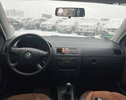 Черный Шкода Фабия, объемом двигателя 1.4 л и пробегом 276 тыс. км за 5440 $, фото 33 на Automoto.ua