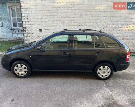 Черный Шкода Фабия, объемом двигателя 1.4 л и пробегом 270 тыс. км за 4400 $, фото 4 на Automoto.ua