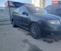 Черный Шкода Фабия, объемом двигателя 1.39 л и пробегом 350 тыс. км за 3990 $, фото 1 на Automoto.ua