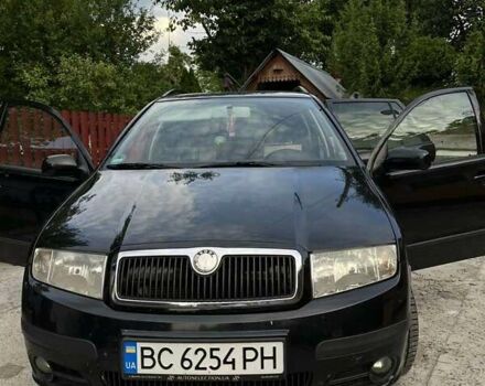 Черный Шкода Фабия, объемом двигателя 1.39 л и пробегом 220 тыс. км за 4650 $, фото 4 на Automoto.ua
