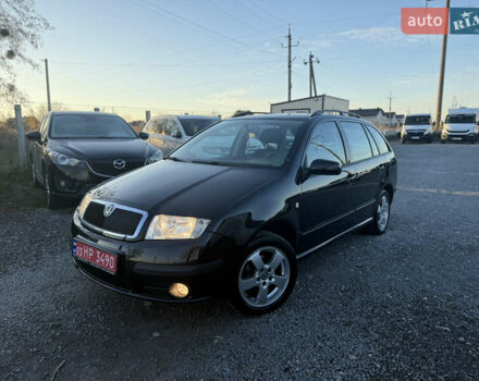 Черный Шкода Фабия, объемом двигателя 1.4 л и пробегом 200 тыс. км за 4999 $, фото 5 на Automoto.ua