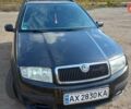 Черный Шкода Фабия, объемом двигателя 1.39 л и пробегом 252 тыс. км за 5000 $, фото 2 на Automoto.ua
