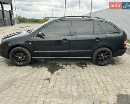 Черный Шкода Фабия, объемом двигателя 1.39 л и пробегом 226 тыс. км за 3900 $, фото 3 на Automoto.ua