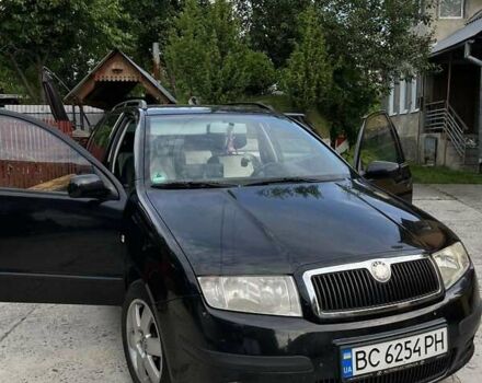 Черный Шкода Фабия, объемом двигателя 1.39 л и пробегом 220 тыс. км за 4650 $, фото 3 на Automoto.ua