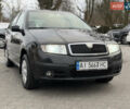 Черный Шкода Фабия, объемом двигателя 1.4 л и пробегом 247 тыс. км за 3500 $, фото 1 на Automoto.ua