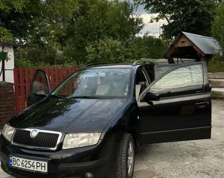 Черный Шкода Фабия, объемом двигателя 1.39 л и пробегом 220 тыс. км за 4650 $, фото 6 на Automoto.ua