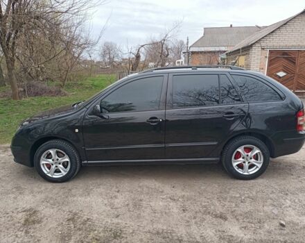 Черный Шкода Фабия, объемом двигателя 1.4 л и пробегом 232 тыс. км за 4999 $, фото 3 на Automoto.ua