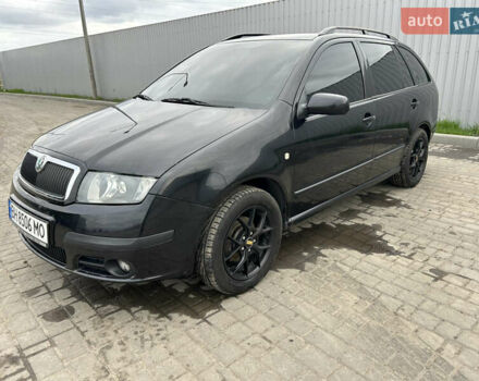 Черный Шкода Фабия, объемом двигателя 1.39 л и пробегом 226 тыс. км за 3900 $, фото 2 на Automoto.ua