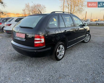 Черный Шкода Фабия, объемом двигателя 1.4 л и пробегом 200 тыс. км за 4999 $, фото 8 на Automoto.ua