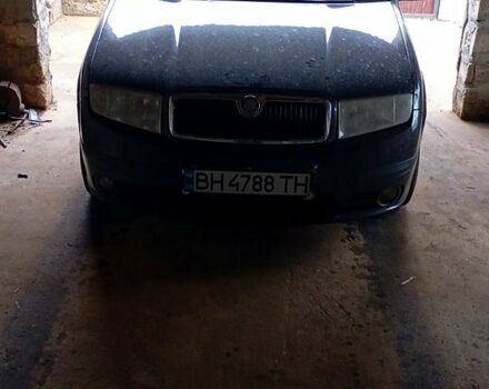 Черный Шкода Фабия, объемом двигателя 1.4 л и пробегом 294 тыс. км за 5100 $, фото 2 на Automoto.ua