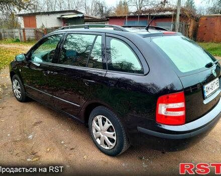 Черный Шкода Фабия, объемом двигателя 1.4 л и пробегом 207 тыс. км за 4300 $, фото 3 на Automoto.ua