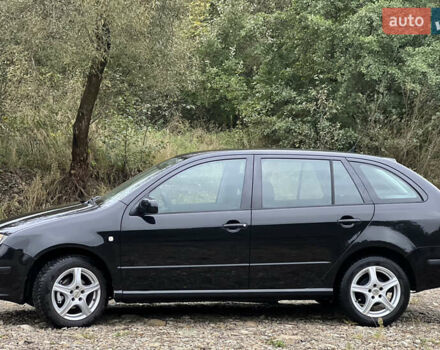 Черный Шкода Фабия, объемом двигателя 1.4 л и пробегом 220 тыс. км за 4450 $, фото 8 на Automoto.ua