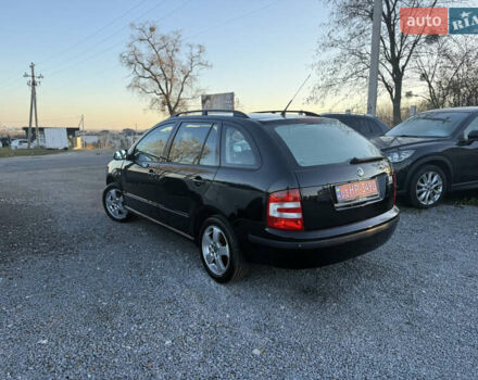 Черный Шкода Фабия, объемом двигателя 1.4 л и пробегом 200 тыс. км за 4999 $, фото 3 на Automoto.ua