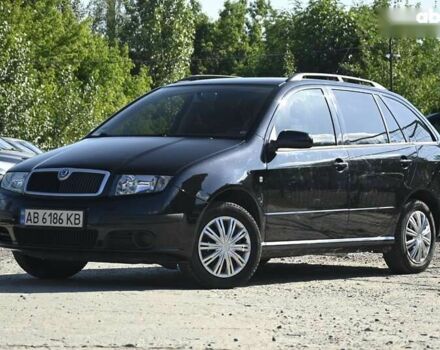 Черный Шкода Фабия, объемом двигателя 1.4 л и пробегом 212 тыс. км за 4999 $, фото 6 на Automoto.ua