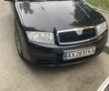 Черный Шкода Фабия, объемом двигателя 1.4 л и пробегом 1000 тыс. км за 5500 $, фото 1 на Automoto.ua