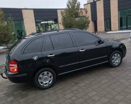 Черный Шкода Фабия, объемом двигателя 1.39 л и пробегом 193 тыс. км за 5500 $, фото 7 на Automoto.ua