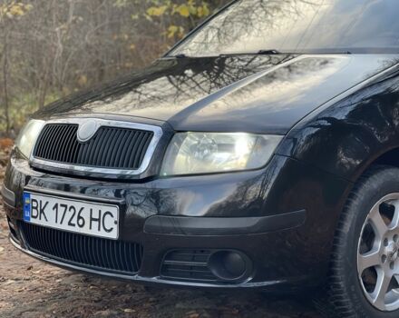 Черный Шкода Фабия, объемом двигателя 1.2 л и пробегом 380 тыс. км за 3100 $, фото 2 на Automoto.ua