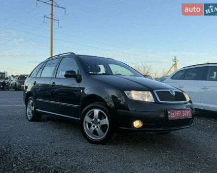 Черный Шкода Фабия, объемом двигателя 1.4 л и пробегом 200 тыс. км за 4999 $, фото 2 на Automoto.ua
