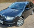 Черный Шкода Фабия, объемом двигателя 1.39 л и пробегом 252 тыс. км за 5000 $, фото 7 на Automoto.ua