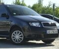 Черный Шкода Фабия, объемом двигателя 1.4 л и пробегом 212 тыс. км за 4999 $, фото 2 на Automoto.ua