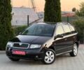 Черный Шкода Фабия, объемом двигателя 1.4 л и пробегом 221 тыс. км за 4950 $, фото 1 на Automoto.ua