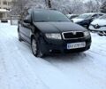 Черный Шкода Фабия, объемом двигателя 1.4 л и пробегом 350 тыс. км за 4100 $, фото 1 на Automoto.ua