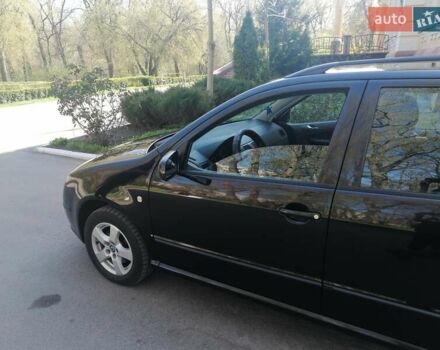 Черный Шкода Фабия, объемом двигателя 1.39 л и пробегом 159 тыс. км за 4800 $, фото 2 на Automoto.ua