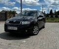 Черный Шкода Фабия, объемом двигателя 1.4 л и пробегом 163 тыс. км за 5499 $, фото 1 на Automoto.ua