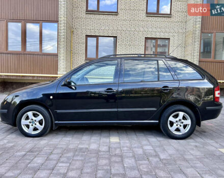 Черный Шкода Фабия, объемом двигателя 1.4 л и пробегом 162 тыс. км за 3999 $, фото 4 на Automoto.ua