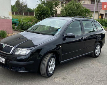 Черный Шкода Фабия, объемом двигателя 1.4 л и пробегом 235 тыс. км за 5000 $, фото 1 на Automoto.ua
