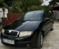 Черный Шкода Фабия, объемом двигателя 1.39 л и пробегом 220 тыс. км за 4650 $, фото 1 на Automoto.ua