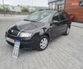 Чорний Шкода Фабія, об'ємом двигуна 1.4 л та пробігом 228 тис. км за 4750 $, фото 1 на Automoto.ua