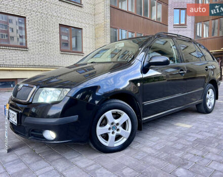 Черный Шкода Фабия, объемом двигателя 1.4 л и пробегом 162 тыс. км за 3999 $, фото 2 на Automoto.ua